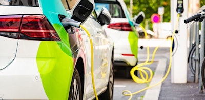 charging-battery-of-an-electric-car-in-city-2021-08-28-13-01-48-utc