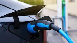 electric-car-refueling-at-a-charging-station-2022-02-08-14-57-32-utc