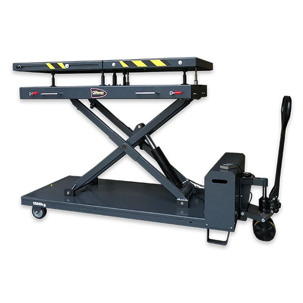 Industrial hydraulic scissor lift table with black frame, yellow safety stripes, and manual hand pump control